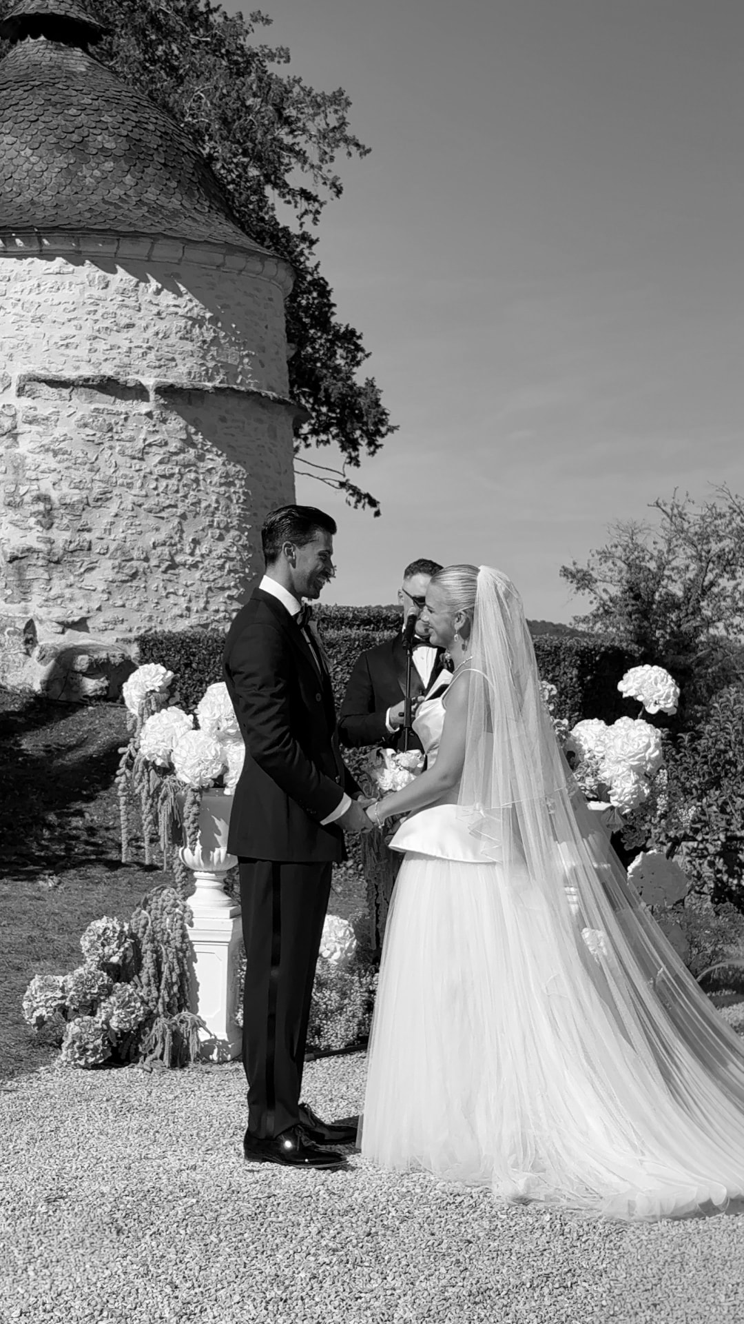 Bride and groom at an outdoor destination wedding ceremony